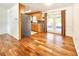 Well-designed kitchen and dining area featuring hardwood floors, modern appliances, and seamless access to the patio at 3304 Alamar St, Lutz, FL 33558