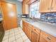 A well-appointed kitchen featuring custom cabinets, stylish backsplash, and quality finishes for a chef's delight at 3304 Alamar St, Lutz, FL 33558