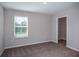 Bedroom with carpet, neutral paint, window, and closet at 36964 Sagemoor Dr, Zephyrhills, FL 33541