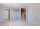 Comfortable bedroom featuring a closet and doorway leading to an ensuite bathroom at 417 41St Ave, St Pete Beach, FL 33706