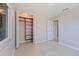 Comfortable bedroom featuring a closet and doorway to another room of the home at 417 41St Ave, St Pete Beach, FL 33706