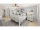 Cozy bedroom with a neutral color palette, plush bedding, and abundant natural light at 417 41St Ave, St Pete Beach, FL 33706