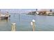 Expansive waterfront view showcasing calm waters, neighboring homes and docks at 417 41St Ave, St Pete Beach, FL 33706