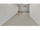 Spacious two car garage providing ample parking and storage for cars and related equipment at 43250 Water Bird Way # 5921, Punta Gorda, FL 33982