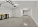 Spacious two car garage providing ample parking and storage for cars and related equipment at 43250 Water Bird Way # 5921, Punta Gorda, FL 33982
