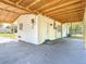 Exterior view of the carport showing its structure at 485 Stillwater Ave, Spring Hill, FL 34606