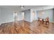 This spacious living room features wood floors and neutral paint, creating a bright and inviting atmosphere at 4895 Bay Ne St # 207, St Petersburg, FL 33703