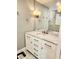Bathroom vanity with drawers, sink, and marble countertop at 5101 Dover Ne St, St Petersburg, FL 33703