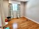 An empty bedroom with hardwood floors and natural light at 5101 Dover Ne St, St Petersburg, FL 33703