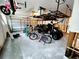 Garage with bikes, golf cart, and overhead storage at 5101 Dover Ne St, St Petersburg, FL 33703