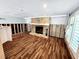 Living room featuring sleek tile flooring and a stone fireplace at 5101 Dover Ne St, St Petersburg, FL 33703