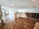 Open-concept living space with tile flooring and access to a swimming pool at 5101 Dover Ne St, St Petersburg, FL 33703