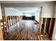 Spacious living room with new flooring, exposed framing and plenty of natural light at 5101 Dover Ne St, St Petersburg, FL 33703