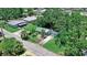 Aerial view of the home showing the cute yard, mature trees, and neighborhood streets at 5119 23Rd S Ave, Gulfport, FL 33707