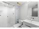 Contemporary bathroom featuring a glass shower, textured wall, and modern vanity at 5153 Isla Key S Blvd # 415, St Petersburg, FL 33715