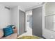 Hallway view featuring a sliding door and bright white marble floors at 5153 Isla Key S Blvd # 415, St Petersburg, FL 33715