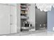 Bright kitchen featuring a pull-out shelf with a coffee maker and ample storage at 5153 Isla Key S Blvd # 415, St Petersburg, FL 33715