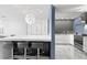 Modern kitchen features sleek countertops, stainless steel appliances, and a breakfast bar for casual dining at 5153 Isla Key S Blvd # 415, St Petersburg, FL 33715