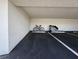 Reserved parking spot with a bike and a storage cover at 5153 Isla Key S Blvd # 415, St Petersburg, FL 33715