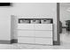 Built in white dresser with storage baskets, and marble floors at 5153 Isla Key S Blvd # 415, St Petersburg, FL 33715