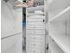 Custom walk-in closet with built-in drawers and ample hanging space at 5153 Isla Key S Blvd # 415, St Petersburg, FL 33715