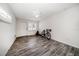 This bedroom has neutral walls, a ceiling fan, a closet, and stylish flooring at 520 34Th N Ave, St Petersburg, FL 33704