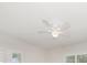 Bright bedroom features a ceiling fan, plantation shutters, and natural light at 520 34Th N Ave, St Petersburg, FL 33704