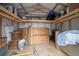 Inside the shed, lumber, moving supplies, and storage containers are piled high on shelves at 520 34Th N Ave, St Petersburg, FL 33704