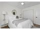 Comfortable bedroom featuring a bed, side tables, and closet at 529 59Th S Way, St Petersburg, FL 33707