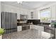 Bright kitchen with granite countertops, stainless steel appliances, and ample cabinet space at 529 59Th S Way, St Petersburg, FL 33707