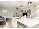 Kitchen island with breakfast bar and stainless dishwasher sink and faucet at 5519 Tripoli Dr, Palmetto, FL 34221