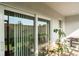 Covered patio boasts sliding glass doors that let in lots of light, and a great place to relax or grill at 5519 Tripoli Dr, Palmetto, FL 34221