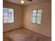A serene bedroom filled with natural light, showcasing large windows and a peaceful ambiance at 5630 47Th N Ave, Kenneth City, FL 33709