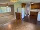 A spacious kitchen connects to a large living area, ideal for Gathering and entertaining at 5630 47Th N Ave, Kenneth City, FL 33709