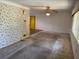 The living room offers a blank canvas with its spacious layout and natural light at 5630 47Th N Ave, Kenneth City, FL 33709