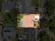 Aerial view of property showing boundaries and landscaping of home, pool, yard, and neighboring properties at 603 Ivey Ln, Tarpon Springs, FL 34689