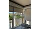 Enjoy scenic views from this charming balcony, complete with cozy seating, and roll-down shades at 6218 Palma Del Mar # 303, St Petersburg, FL 33715