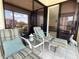 Inviting balcony featuring cushioned seating and stylish decor, perfect for enjoying scenic views and fresh air at 6218 Palma Del Mar # 303, St Petersburg, FL 33715