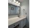 Charming bathroom featuring a sleek countertop and vanity offering ample storage and a cozy makeup area at 6218 Palma Del Mar # 303, St Petersburg, FL 33715