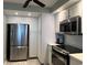 Updated kitchen featuring stainless steel appliances and ample storage space at 6218 Palma Del Mar # 303, St Petersburg, FL 33715