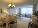 Inviting living room and dining area filled with natural light and comfortable seating at 6218 Palma Del Mar # 303, St Petersburg, FL 33715