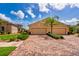 Charming home featuring a brick driveway, well-manicured landscaping, and a two-car garage at 644 Chipper Dr, Sun City Center, FL 33573