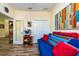 Multipurpose room includes a printer, futon, closet, and decor for a relaxing or productive work environment at 644 Chipper Dr, Sun City Center, FL 33573