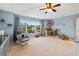 Charming Bedroom featuring a comfortable glider, colorful décor and ample play space at 6677 84Th N Ave, Pinellas Park, FL 33781