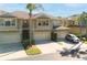 Charming two-story townhomes featuring attached garages and well-maintained landscaping in a desirable neighborhood at 6677 84Th N Ave, Pinellas Park, FL 33781