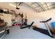 Spacious garage with workout equipment and ample storage space at 6677 84Th N Ave, Pinellas Park, FL 33781