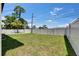 Spacious and well-maintained backyard with a lush lawn and privacy fence at 729 89Th N Ave, St Petersburg, FL 33702