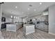 This is a spacious kitchen with dual islands, stainless steel appliances, and hardwood floors at 729 89Th N Ave, St Petersburg, FL 33702