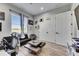A home office including stylish decor, couch, and a view of the outdoors at 729 89Th N Ave, St Petersburg, FL 33702