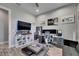 A decorated home office, with decor, gaming equipment and a view of the outdoors at 729 89Th N Ave, St Petersburg, FL 33702